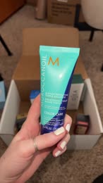 Video review of Moroccanoil Blonde Perfecting Purple Shampoo  by penguinella