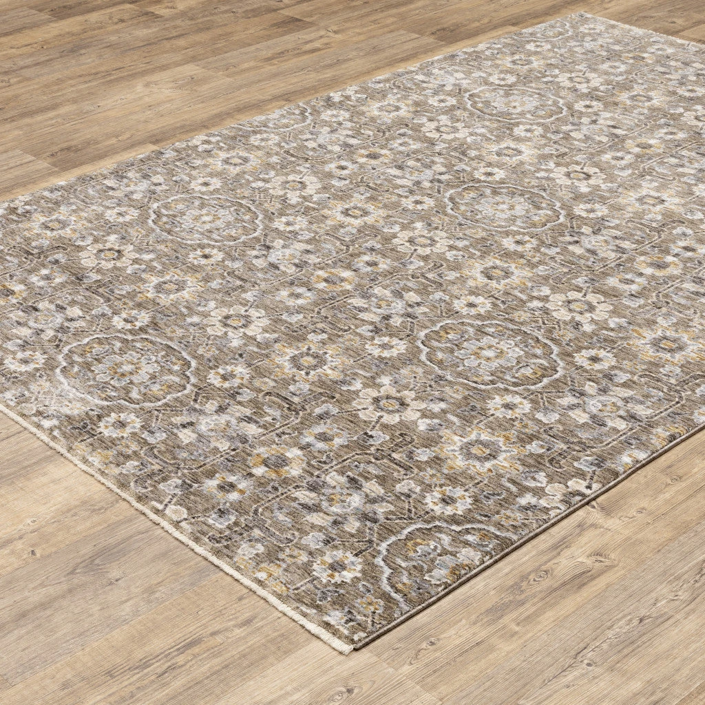 HomeRoots Floral Power Loom Stain Resistant Area Rug With Fringe