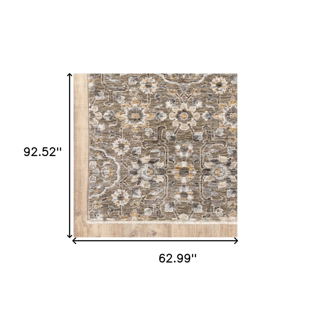 HomeRoots Floral Power Loom Stain Resistant Area Rug With Fringe
