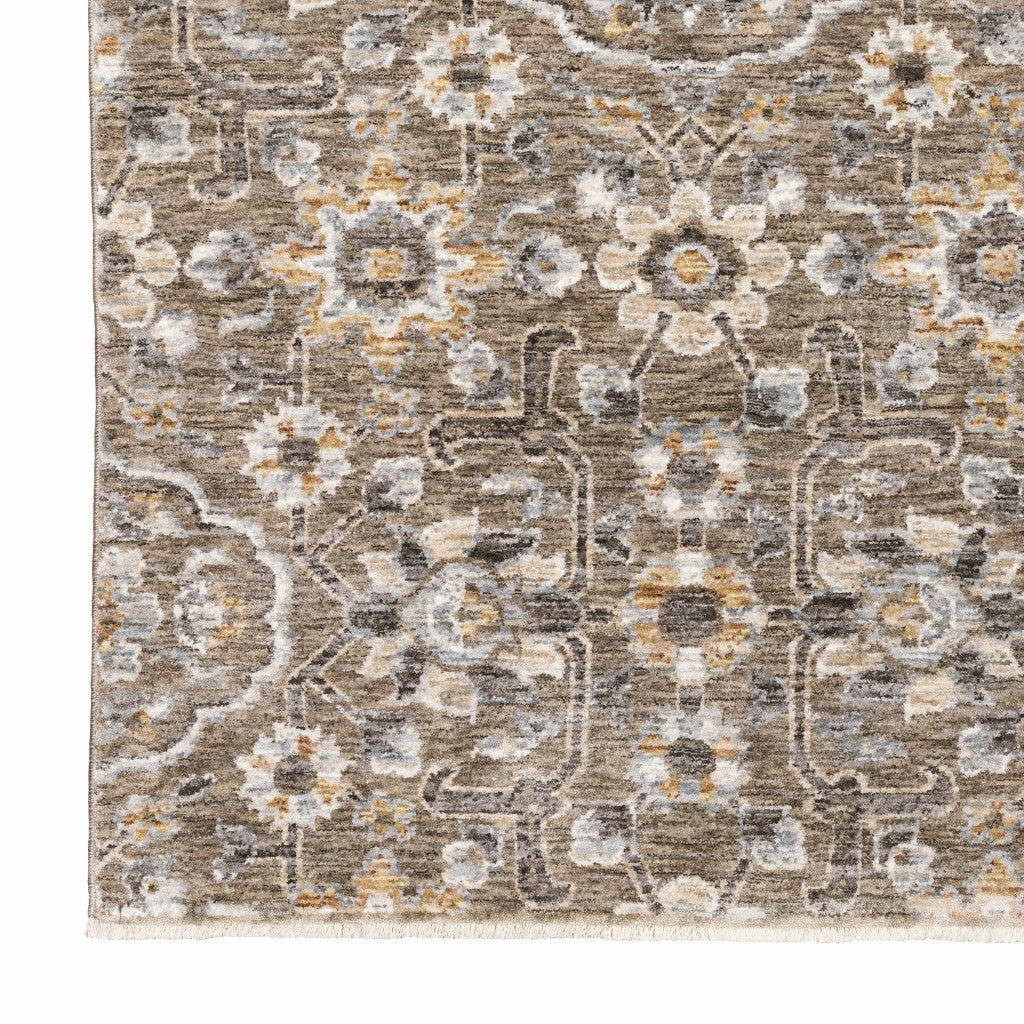 HomeRoots Floral Power Loom Stain Resistant Area Rug With Fringe
