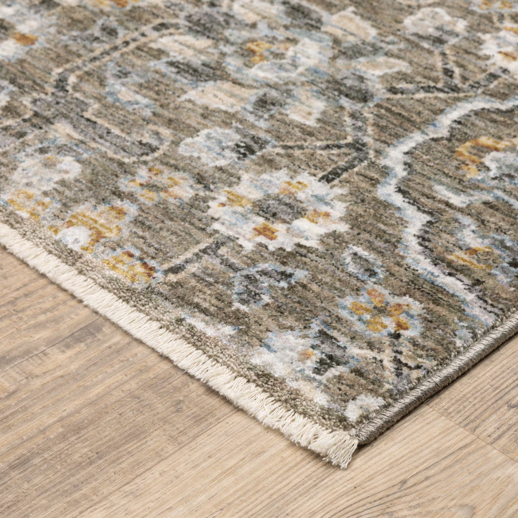 HomeRoots Floral Power Loom Stain Resistant Area Rug With Fringe