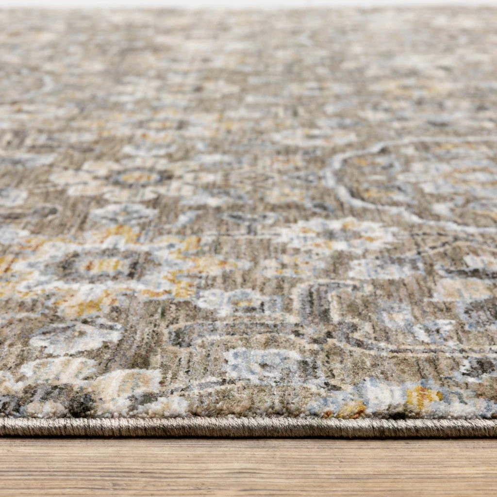 HomeRoots Floral Power Loom Stain Resistant Area Rug With Fringe