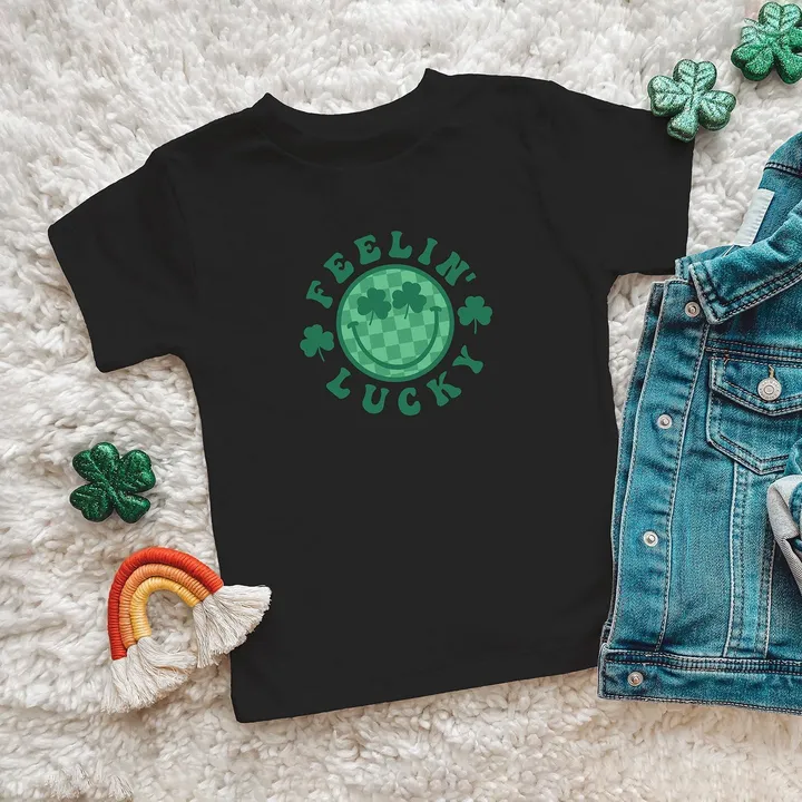 The Juniper Shop Feelin Lucky Checkered Smiley Face | Toddler Short Sleeve Crew Neck